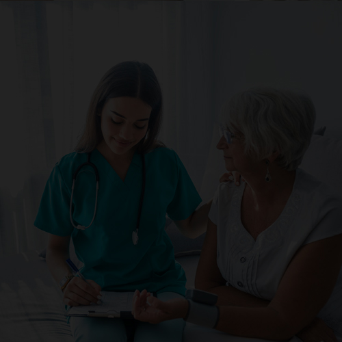 Patient care technician working with resident at long term nursing facility